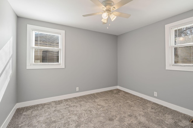 unfurnished room featuring carpet flooring and ceiling fan