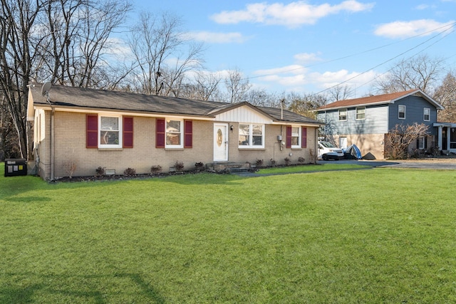 ranch-style home with a front yard