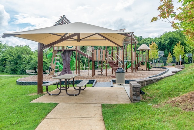 view of community with a yard and a playground