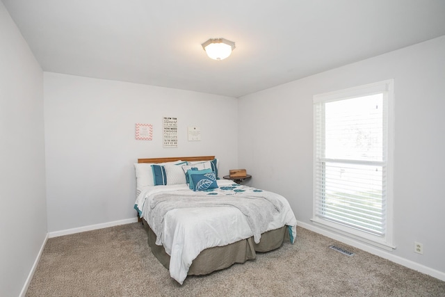 bedroom featuring carpet flooring