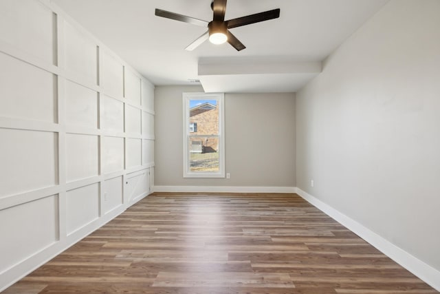 unfurnished room with hardwood / wood-style flooring and ceiling fan