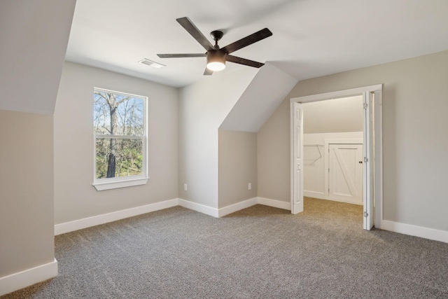 bonus room featuring vaulted ceiling, ceiling fan, and carpet floors