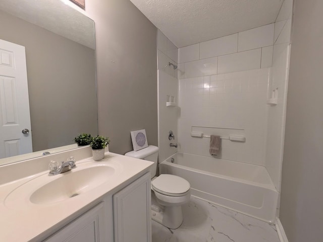 full bathroom featuring vanity, a textured ceiling, shower / bathtub combination, and toilet