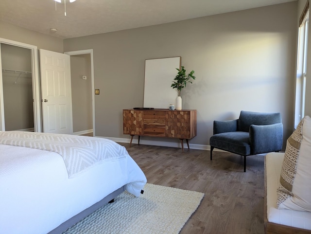 bedroom with hardwood / wood-style flooring