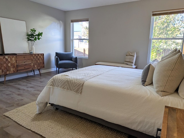 bedroom with wood-type flooring