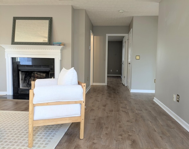 living area featuring hardwood / wood-style flooring