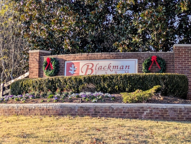 view of community sign