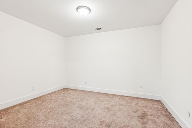 empty room featuring carpet floors