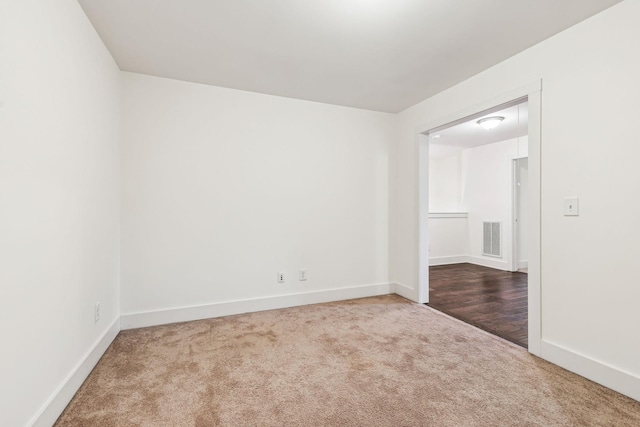 unfurnished room with carpet