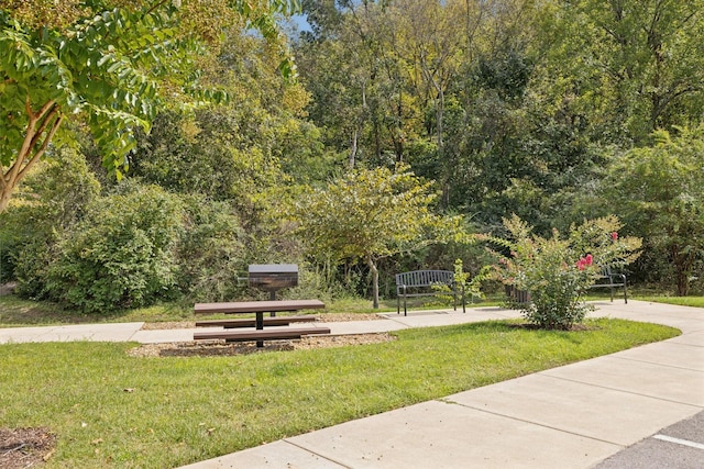 view of home's community featuring a yard