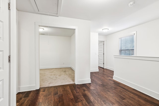 empty room featuring dark hardwood / wood-style floors