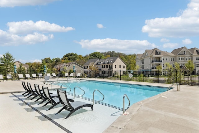 view of pool featuring a patio