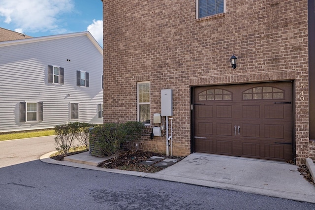 exterior space with a garage