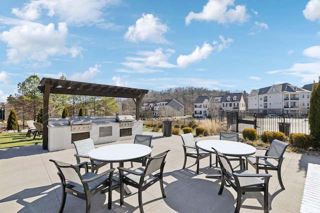 view of patio with exterior kitchen and area for grilling