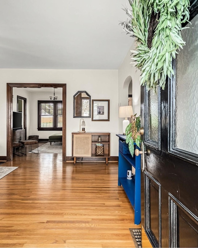 entrance foyer with hardwood / wood-style flooring