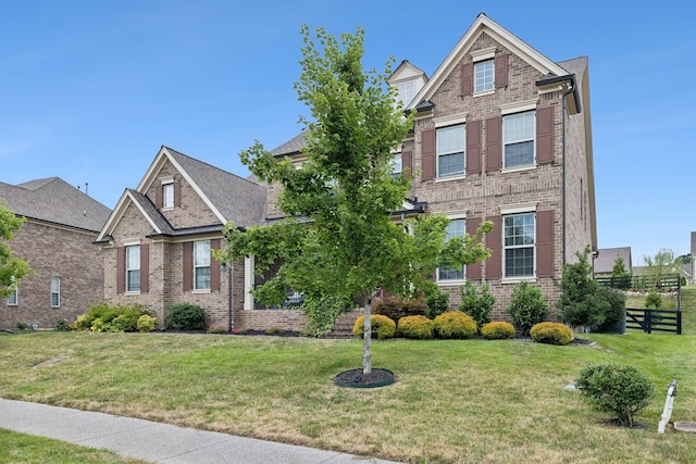 craftsman house with a front lawn