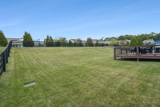 view of yard with a deck