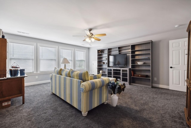 carpeted living room featuring ceiling fan