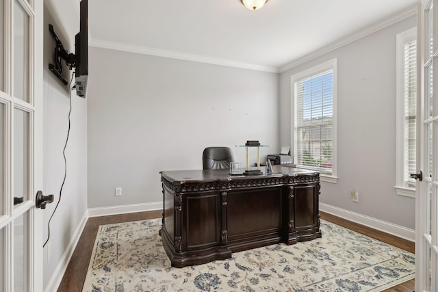 office featuring hardwood / wood-style flooring and crown molding