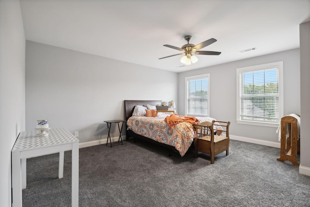 carpeted bedroom with ceiling fan