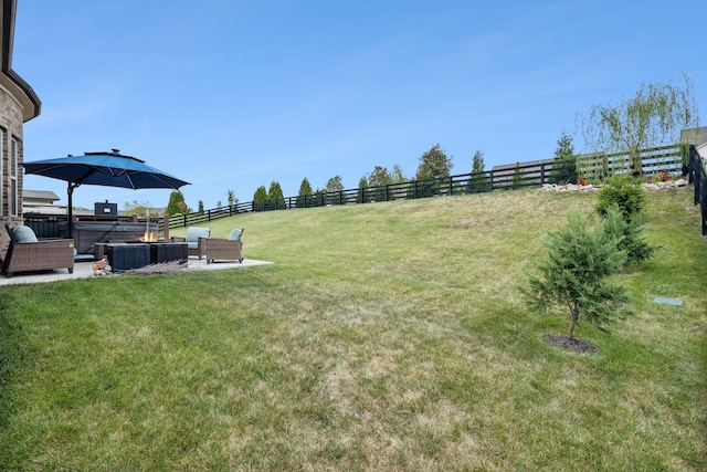 view of yard featuring outdoor lounge area, a patio, and a hot tub