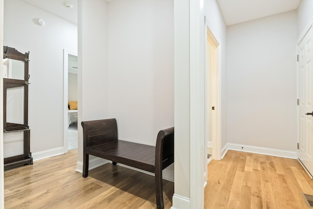 hallway featuring light hardwood / wood-style flooring