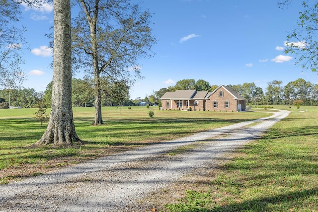 view of front facade with a front yard