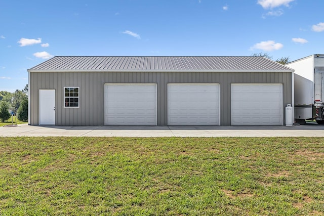 garage with a lawn