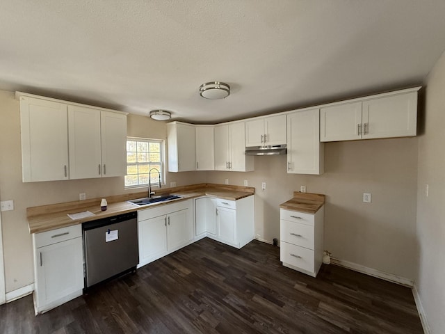 kitchen featuring butcher block counters, sink, white cabinetry, dark hardwood / wood-style flooring, and dishwasher