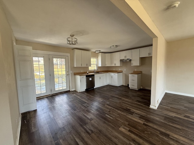 kitchen featuring dishwasher, dark wood-type flooring, sink, and white cabinets