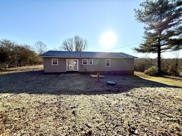 back of property featuring french doors