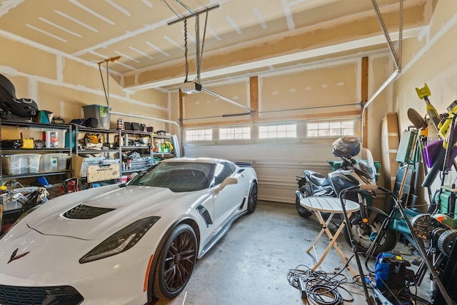 garage featuring a garage door opener