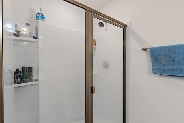 bathroom featuring an enclosed shower