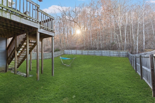 view of yard with a wooden deck