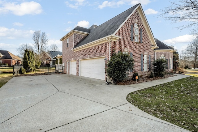 view of side of property with a garage