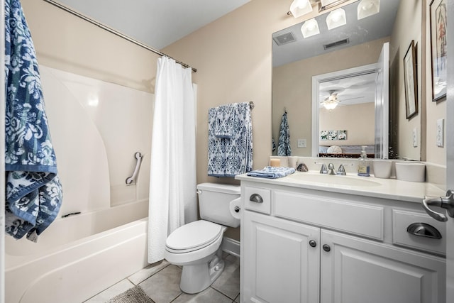 full bathroom featuring tile patterned flooring, vanity, ceiling fan, toilet, and shower / bath combo