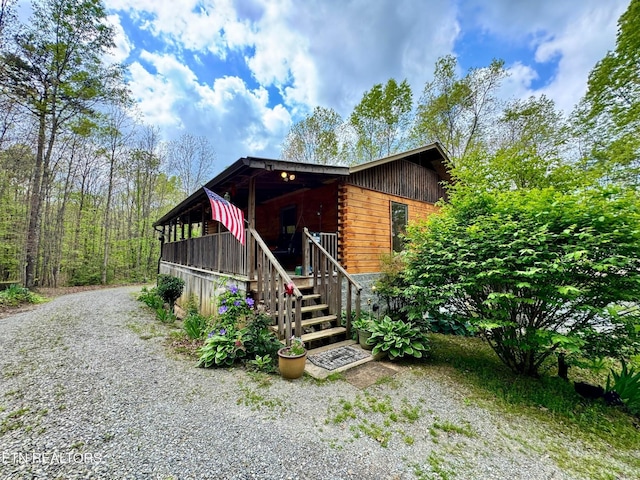 907 Parkstown Ext, Wilder, TN 38589 - exterior space featuring a porch and gravel driveway