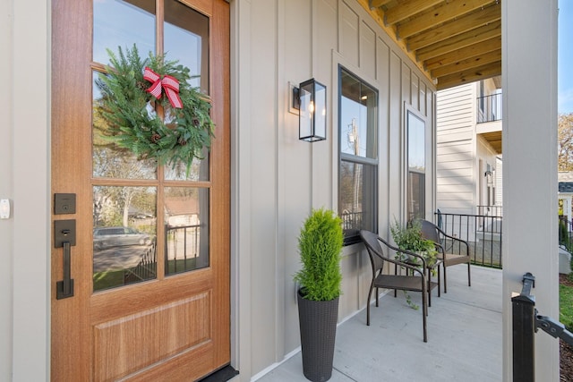 entrance to property with covered porch