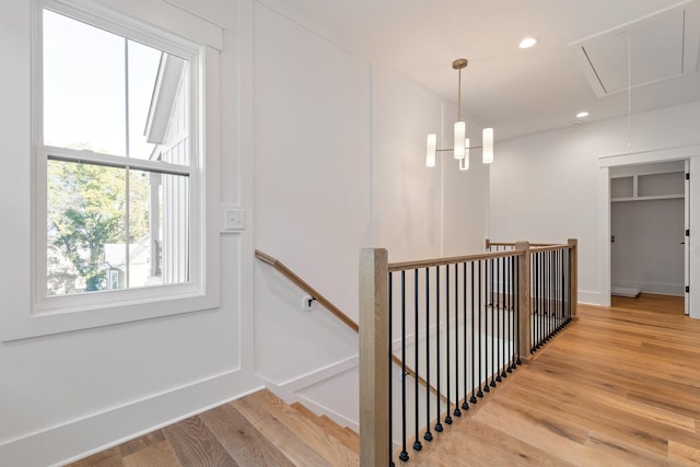 stairway with wood-type flooring