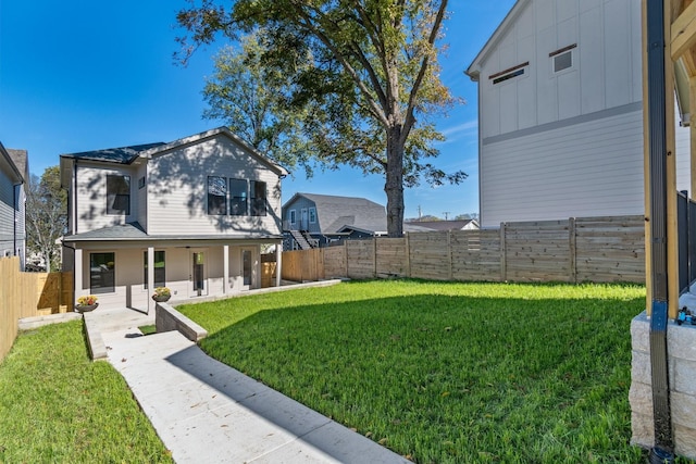 view of yard with a patio area