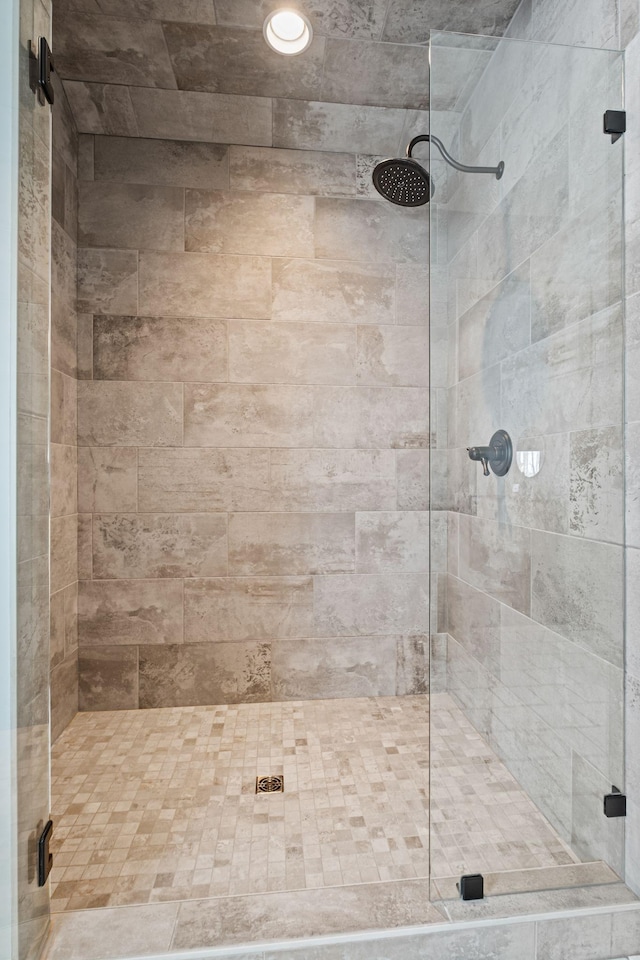 bathroom featuring an enclosed shower