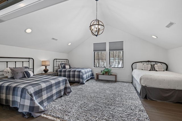 bedroom featuring lofted ceiling, a notable chandelier, and dark hardwood / wood-style floors