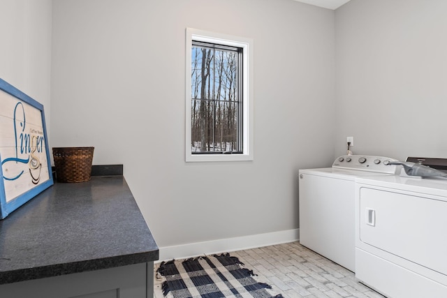 washroom with independent washer and dryer