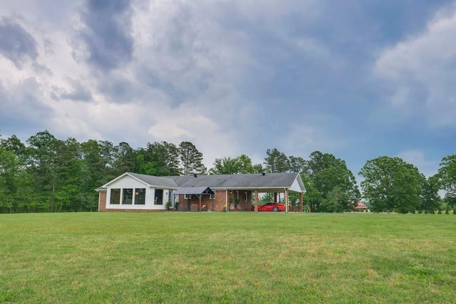 ranch-style home with a front yard