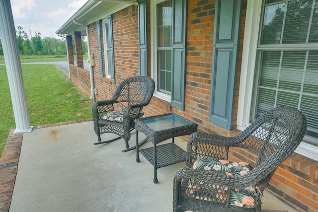 view of patio featuring a porch