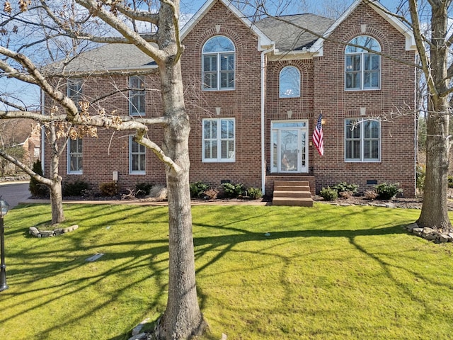 view of front facade with a front yard