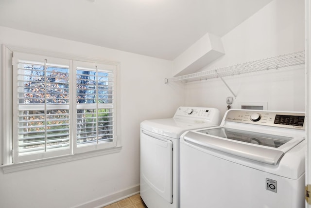 laundry room with washer and clothes dryer