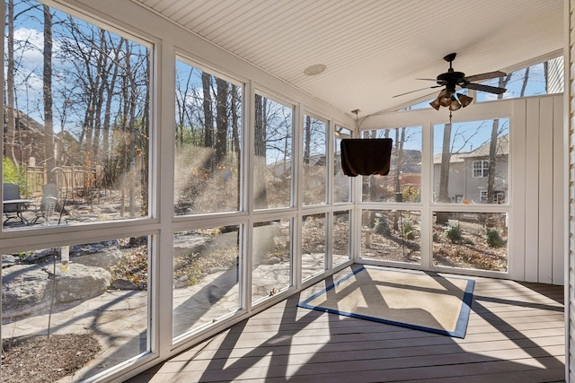 sunroom with vaulted ceiling