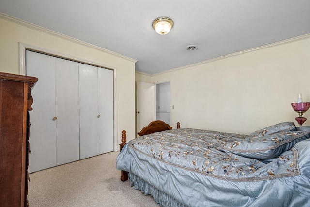 bedroom featuring light colored carpet, ornamental molding, and a closet