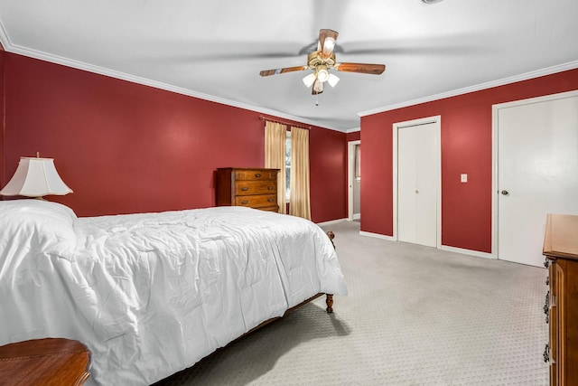 bedroom featuring crown molding, ceiling fan, and carpet flooring